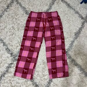 Pink women’s size medium pajama pants with dogs